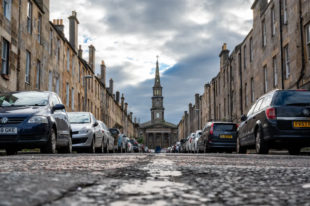 Georgian terraces of Edinburgh's New Town, identical sandstone facades running the length of the street